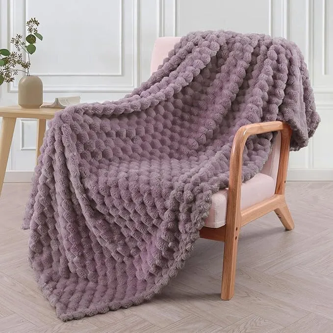 Children's soft plaid polyester blanket shown in camel colour, suitable for nap time.