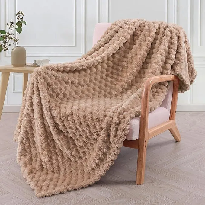 Children's soft plaid polyester blanket shown in camel colour, suitable for nap time.