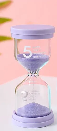 Handmade glass sand clock timer in blue colour showing sand flow for time intervals.