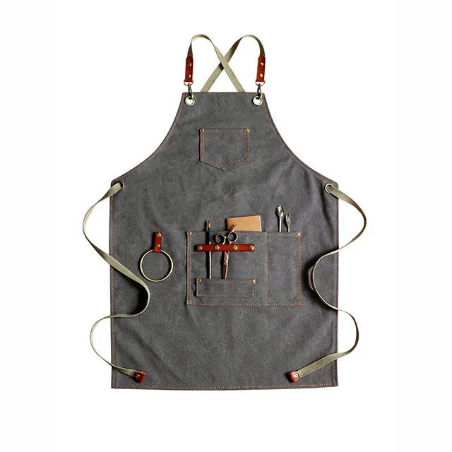 Canvas apron with cross-strap design in camel colour for café work and baking