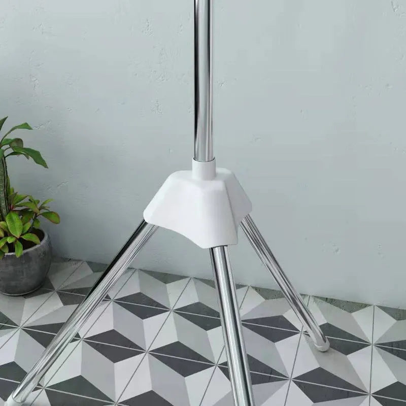 Three-layer stainless steel clothes drying rack with plastic clips for socks, ties, and trousers organisation