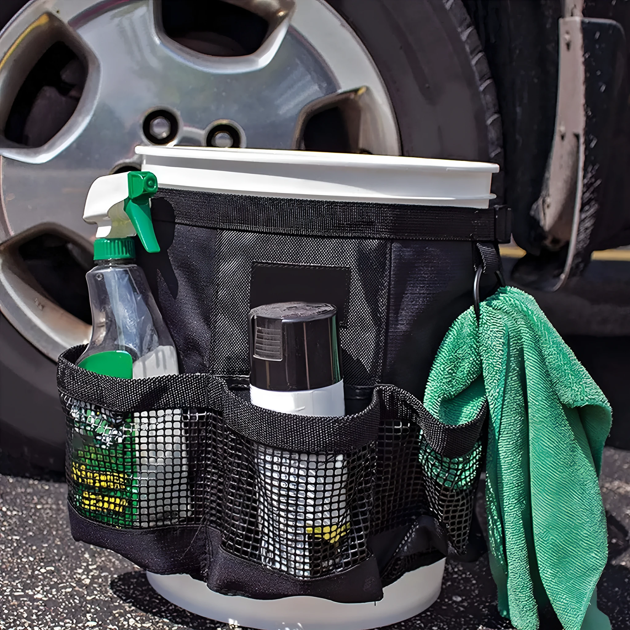 Black cylindrical polyester buggy storage bag hanging from a 5-gallon barrel.