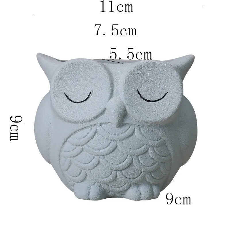 Handmade ceramic succulent pot with cartoon owl design in frosted pastel colour