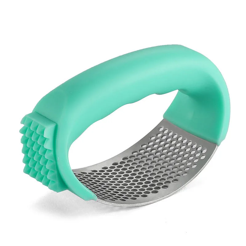 304 stainless steel garlic press in green, pink, black or blue measuring 11cm by 7cm