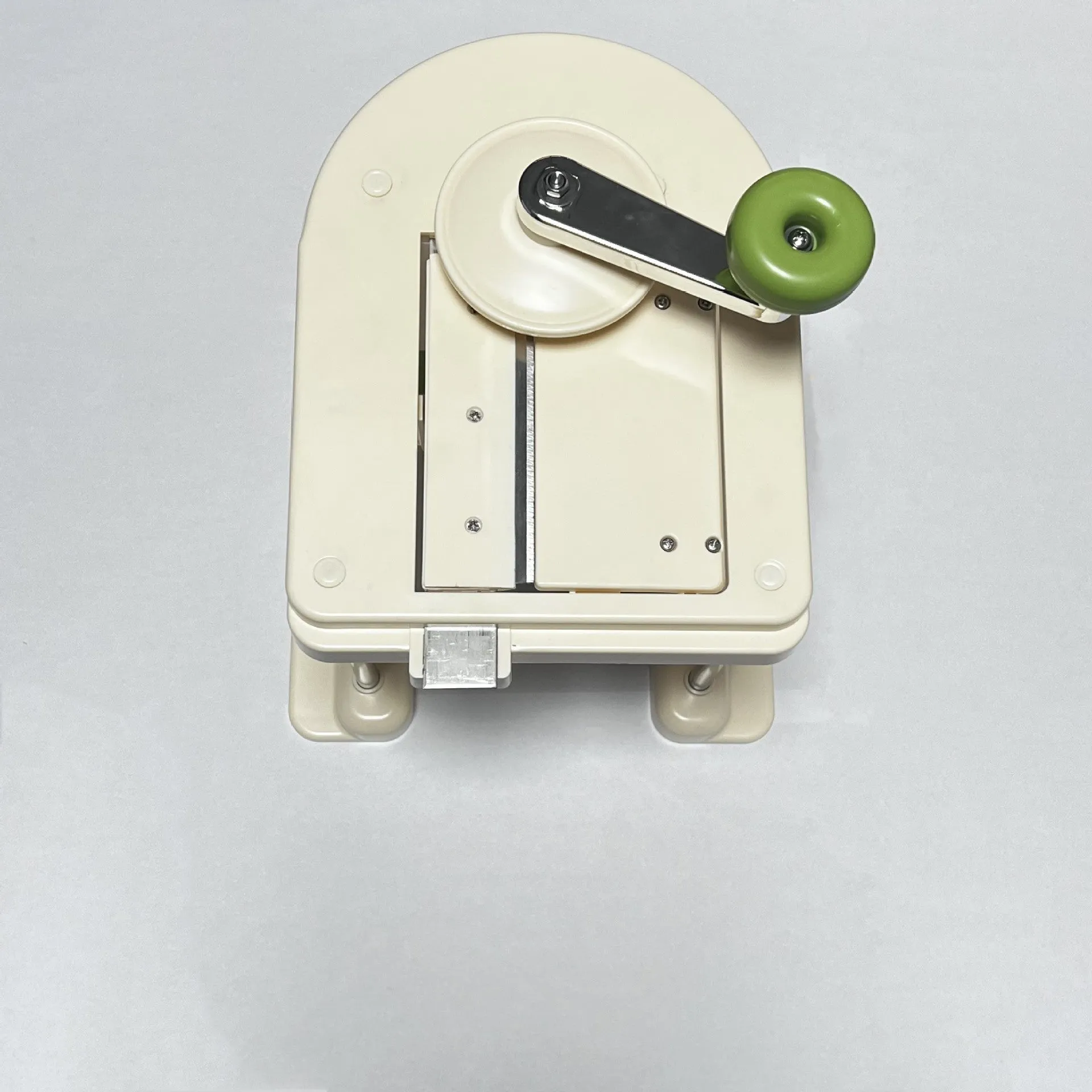 Beige household vegetable slicer chopper with stainless steel blades for potatoes and healthy meal prep