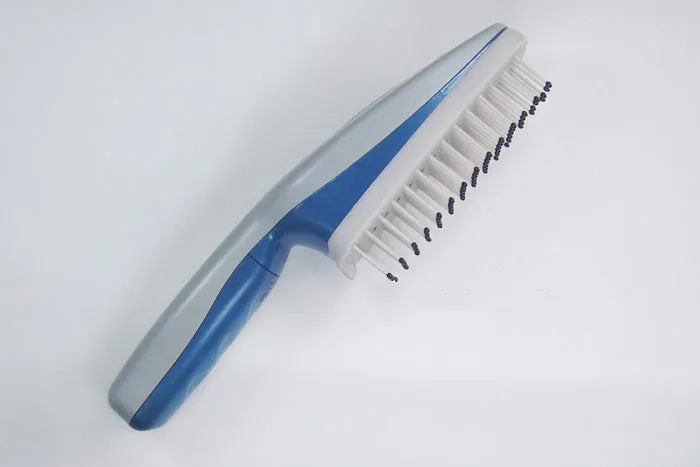 A white pet comb with a removable brush head and a handle housing negative ion and active oxygen technology.
