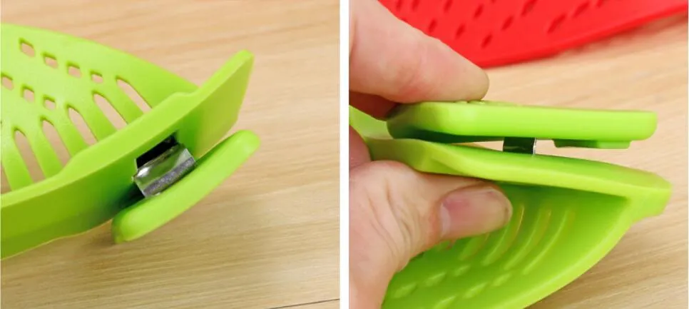 Silicone clip-on kitchen strainer with stainless steel frame attached to pot rim for draining liquids