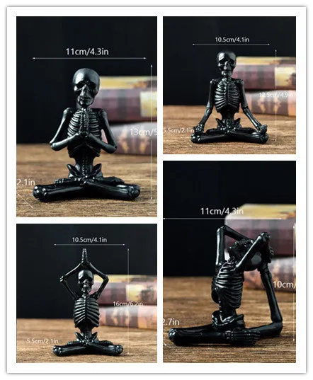 Hand-painted resin yoga pose skull skeleton ornament measuring 10.5-11cm wide on wooden desktop