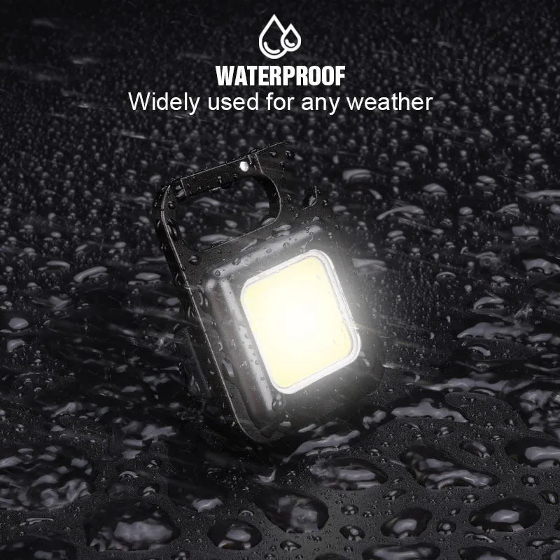 Black aluminium alloy USB rechargeable keychain flashlight with magnetic base and foldable handle