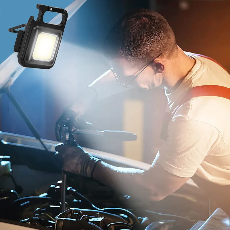 Black aluminium alloy USB rechargeable keychain flashlight with magnetic base and foldable handle