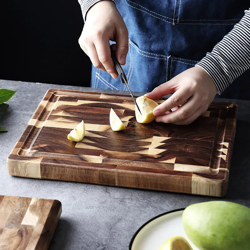 Brown acacia solid wood cutting board showing 3cm thickness edge