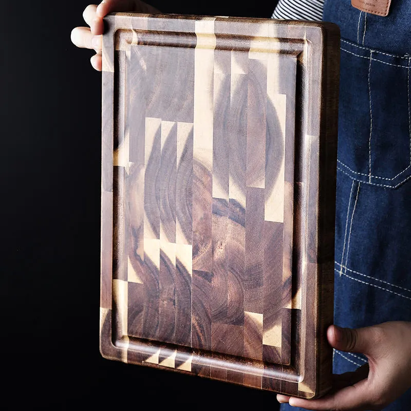 Brown acacia solid wood cutting board showing 3cm thickness edge