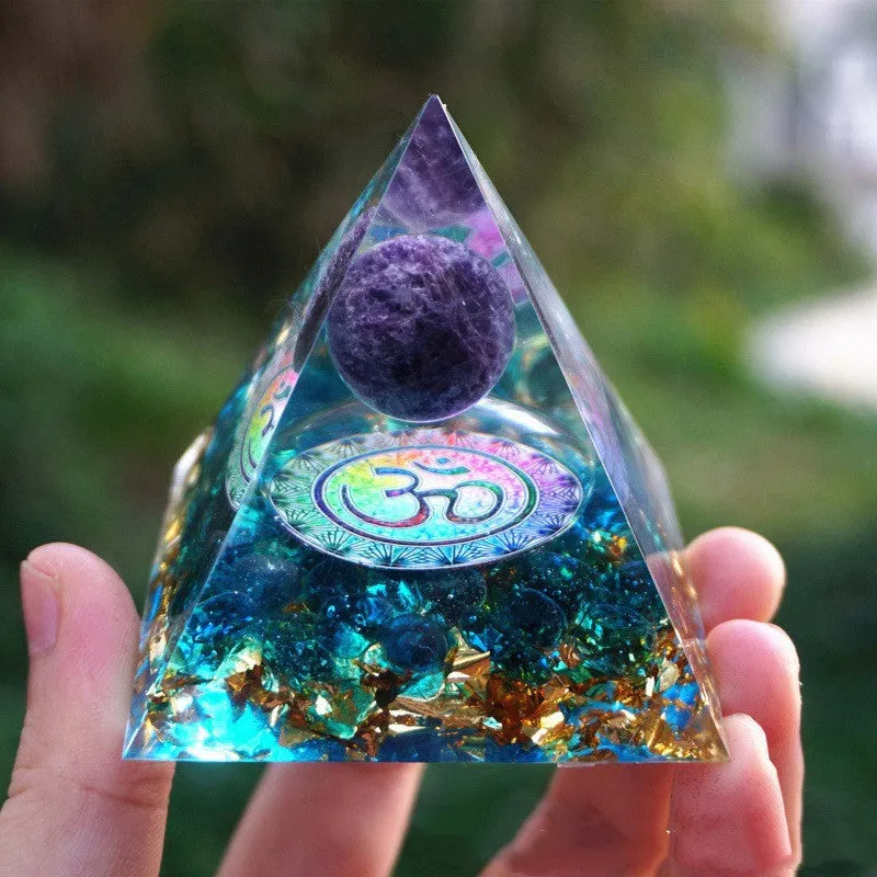 6cm crystal epoxy pyramid decoration with natural gravel visible through transparent resin in Lapis lazuli blue colour
