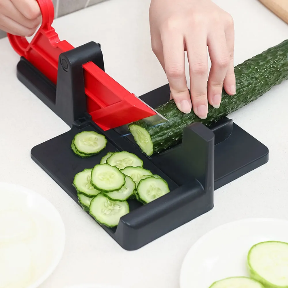 Green vegetable cutter with stainless steel blades for carrot and potato slicing in kitchen