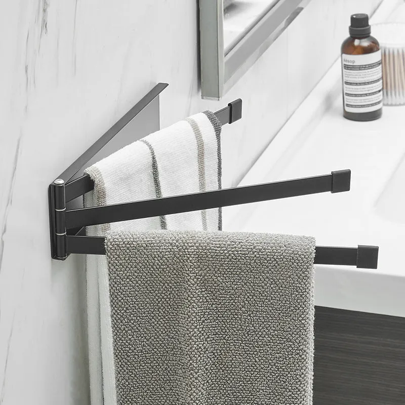 Nordic style folding towel rack in black mounted on bathroom wall without drilling