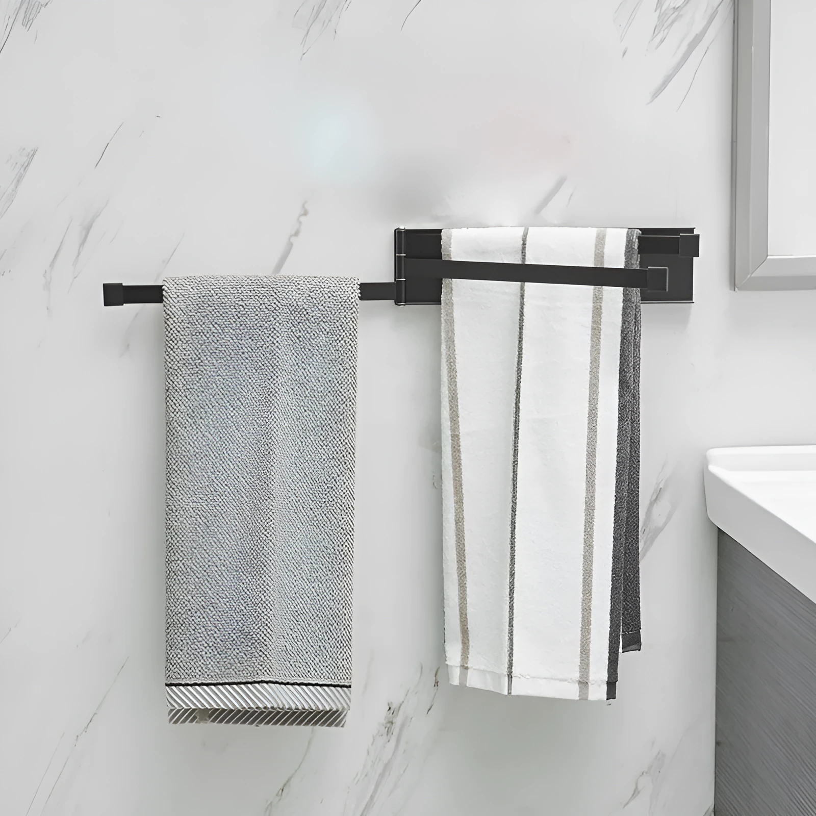 Nordic style folding towel rack in black mounted on bathroom wall without drilling