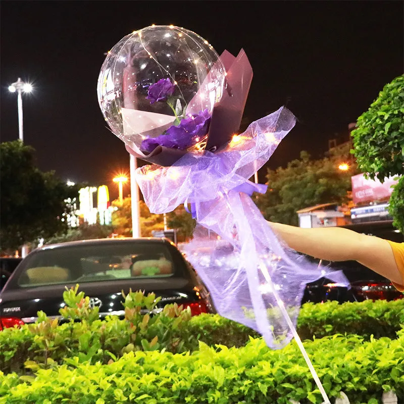 DIY LED luminous transparent balloon rose bouquet kit with artificial flowers and lights for assembly.