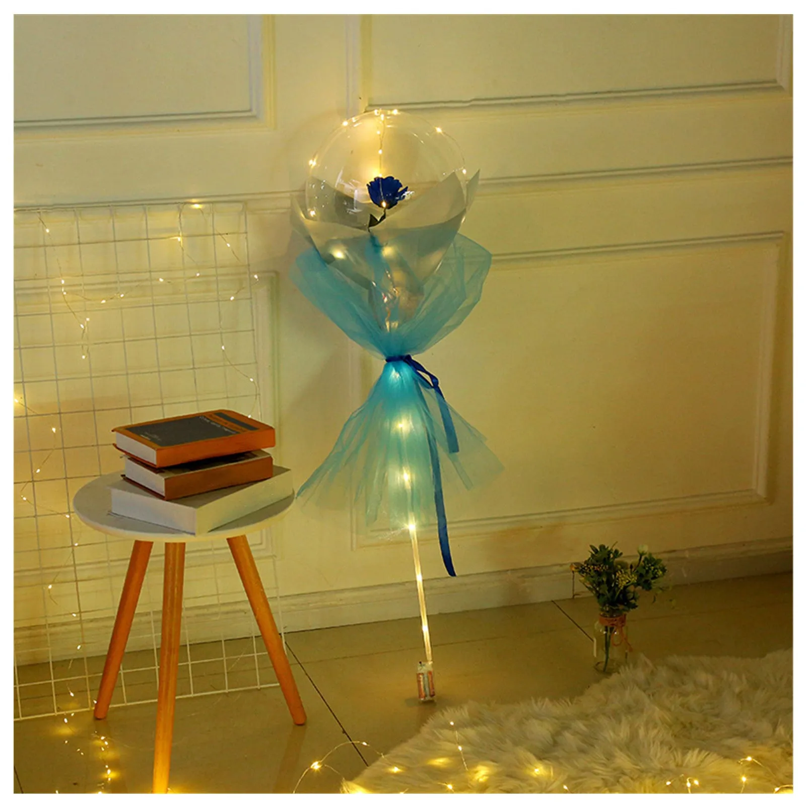 DIY LED luminous transparent balloon rose bouquet kit with artificial flowers and lights for assembly.