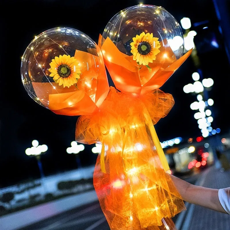 DIY LED luminous transparent balloon rose bouquet kit with artificial flowers and lights for assembly.