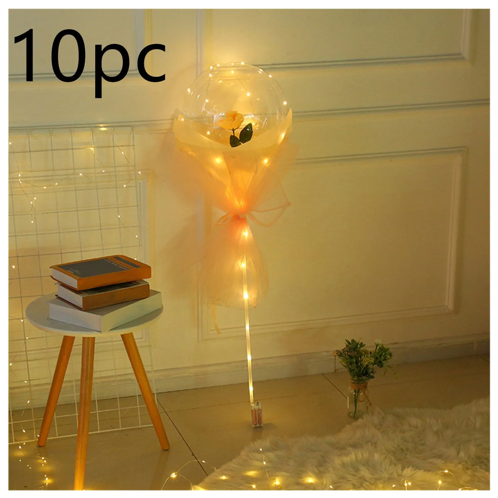 DIY LED luminous transparent balloon rose bouquet kit with artificial flowers and lights for assembly.