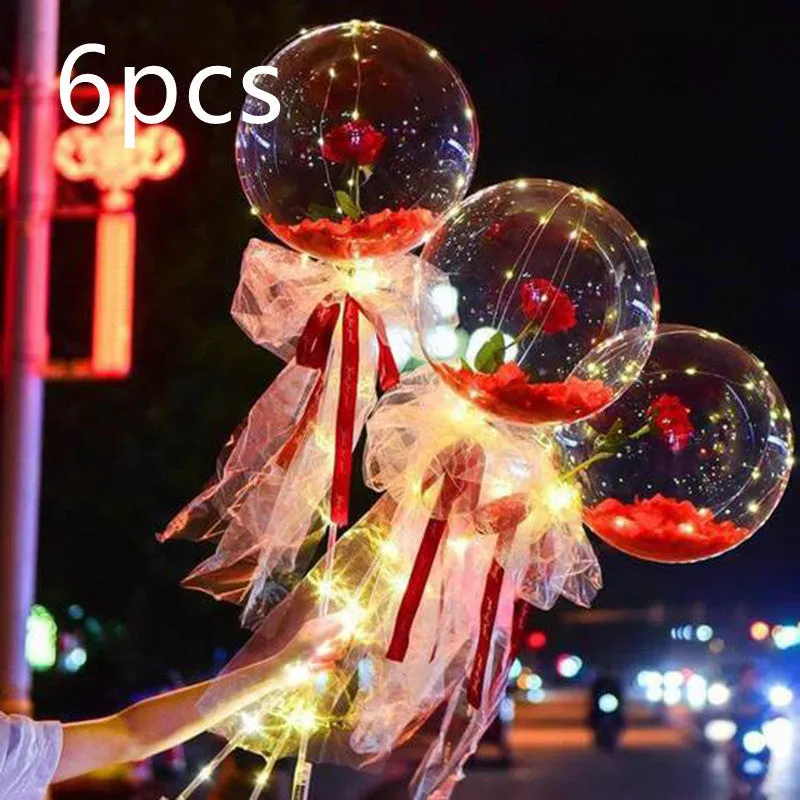 DIY LED luminous transparent balloon rose bouquet kit with artificial flowers and lights for assembly.