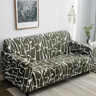 Printed geometric pattern stretch sofa slipcover fitted on a modern three-seater sofa.