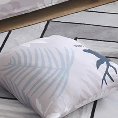 Printed geometric pattern stretch sofa slipcover fitted on a modern three-seater sofa.