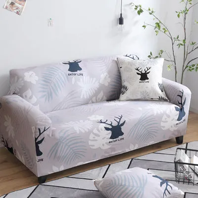 Printed geometric pattern stretch sofa slipcover fitted on a modern three-seater sofa.