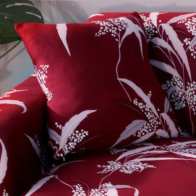Printed geometric pattern stretch sofa slipcover fitted on a modern three-seater sofa.