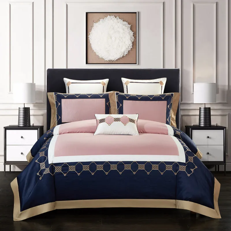 Four-piece cotton embroidery bed set showing decorative pattern on 100% cotton satin weave fabric