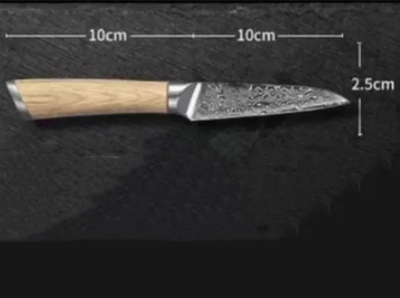 V gold Damascus kitchen knife set with 67-layer steel construction showing distinctive patterning on multiple blade sizes