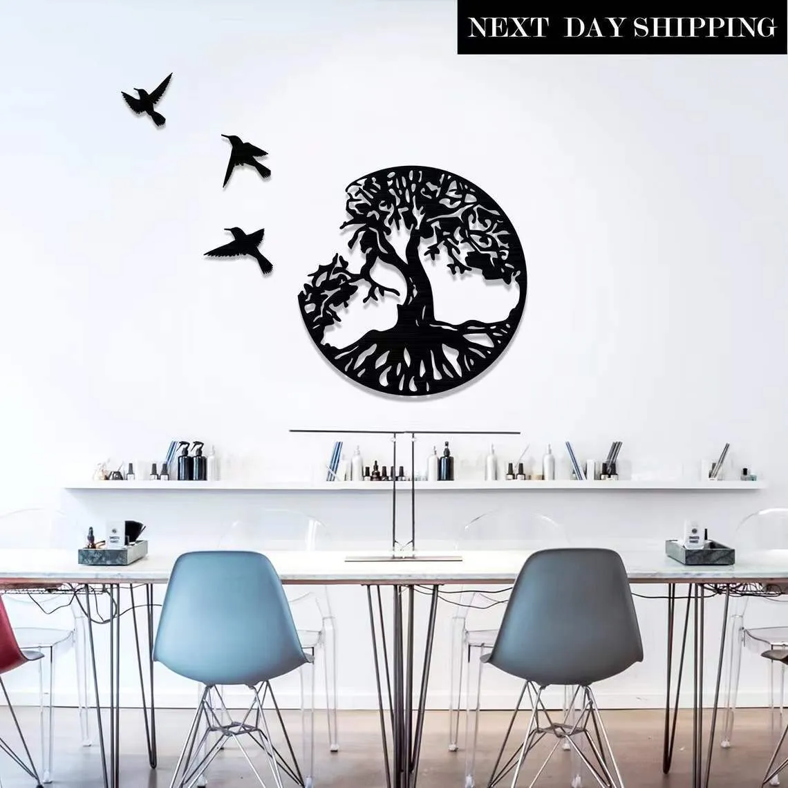 Black electroplated iron wind chime wall hanging in a modern simple style.