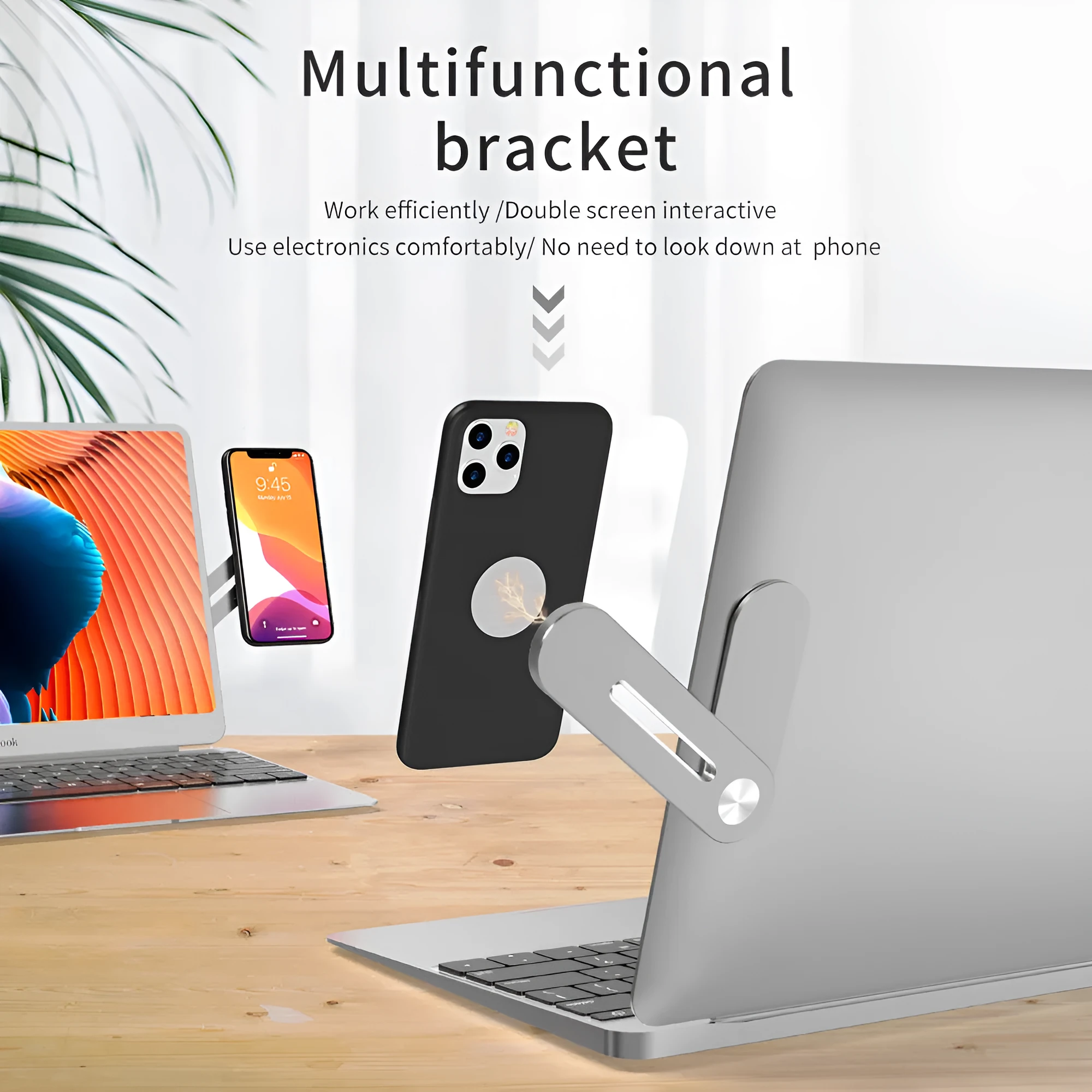 Silver aluminium laptop extension bracket holding a phone next to a computer screen.