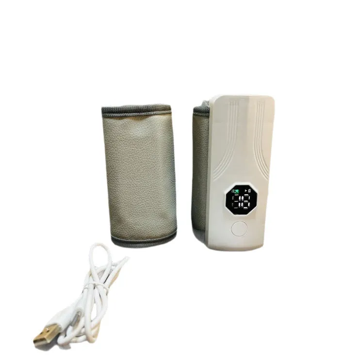 Grey and white car charger electric milk warmer for baby bottles on a 12V DC socket.
