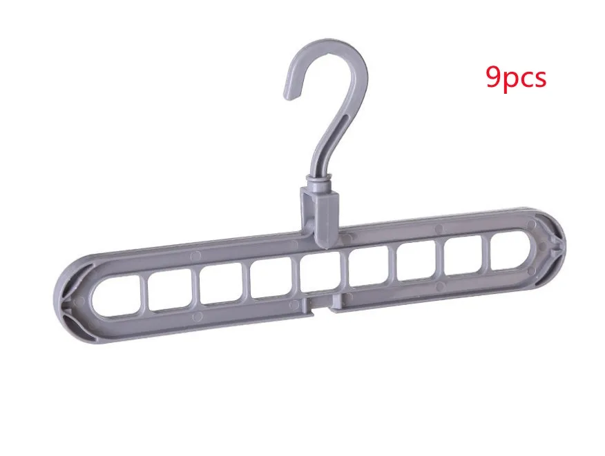 Plastic clothes hanger with a white hook on a pink background, showing its 33 cm length and rotatable handle.