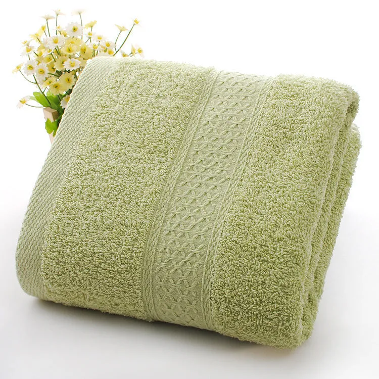 Thick bath and beach towels in seven colour options including apple green, dark blue, and light pink
