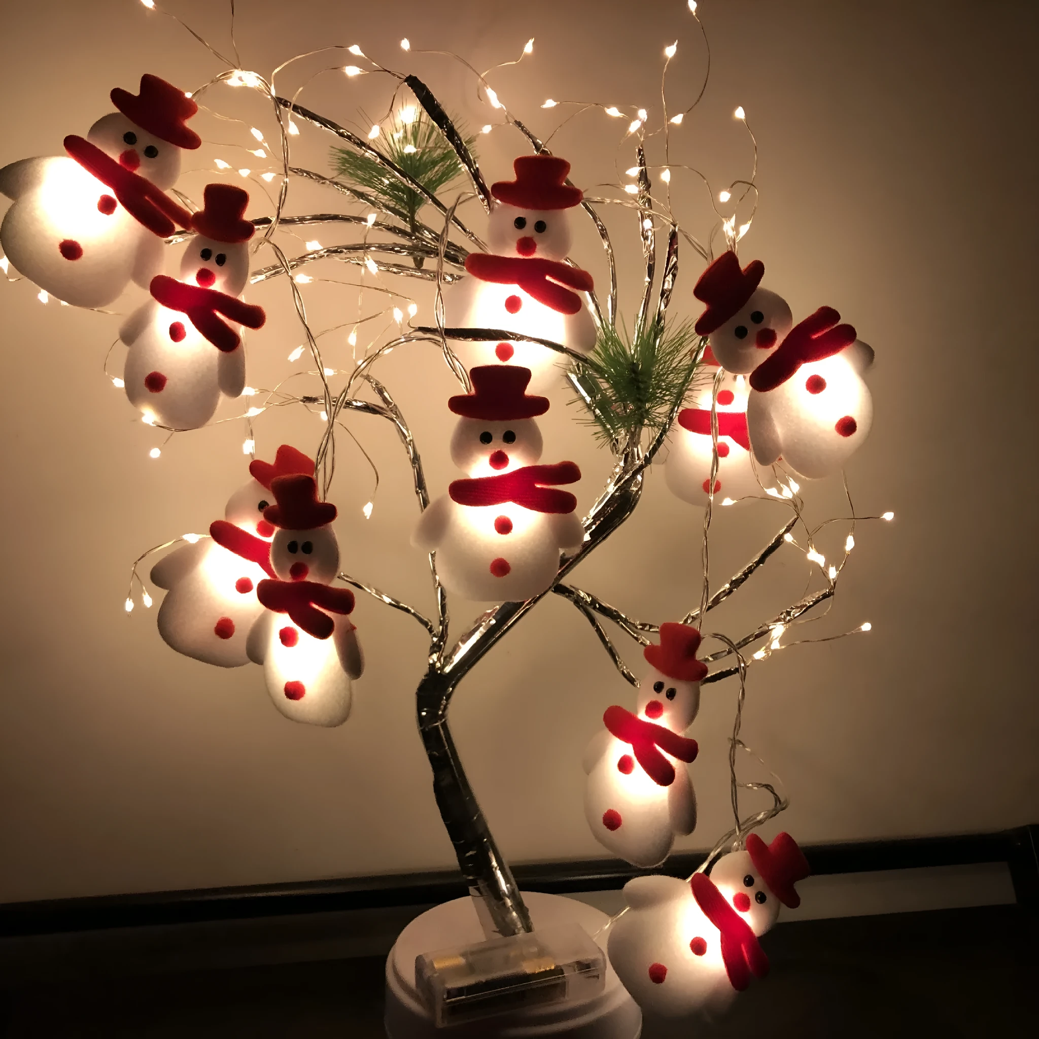 Christmas snowman LED string lights garland with warm white bulbs and character decorations