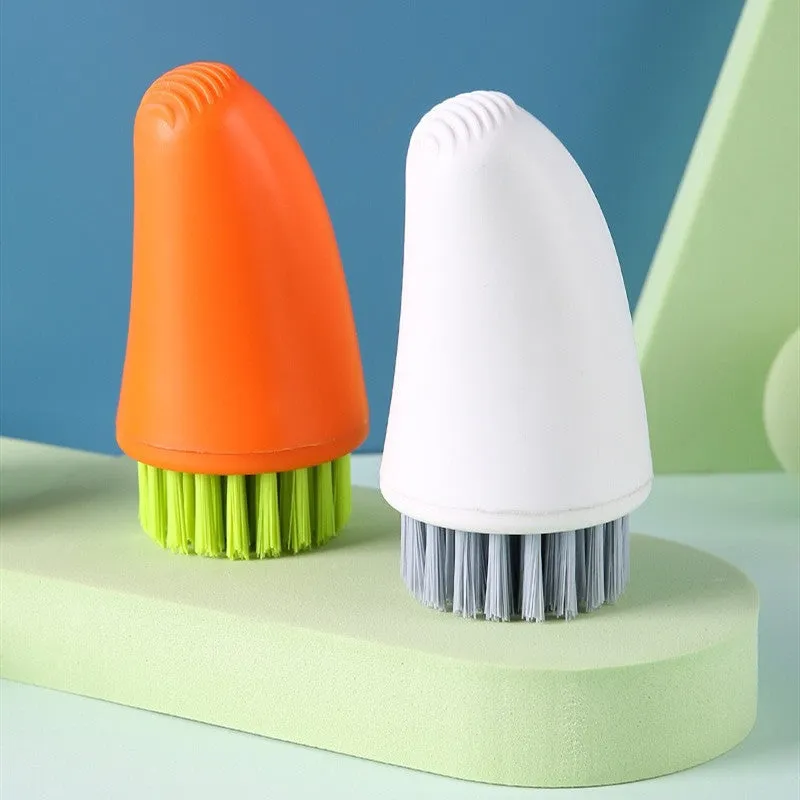 Carrot-shaped nylon kitchen cleaning brush in orange colour, 14.5cm length