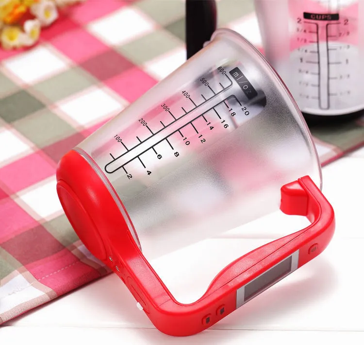 Green digital measuring cup scale with LCD display showing weight measurement