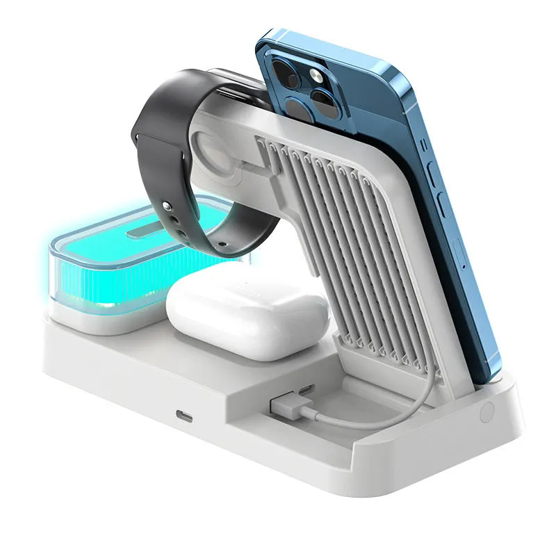 White 4-in-1 wireless charger station with foldable stand, alarm clock display, and RGB night light charging multiple devices