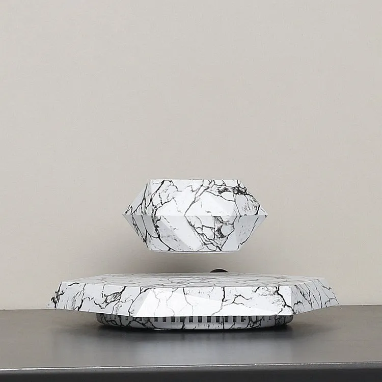 Marbling colour magnetic levitating plant pot floating with bonsai in modern home setting