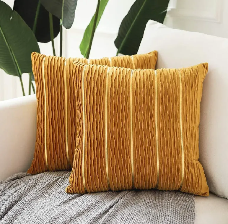 Soft striped velvet pillow cover for a sofa cushion in silver grey colour, shown on a chair.