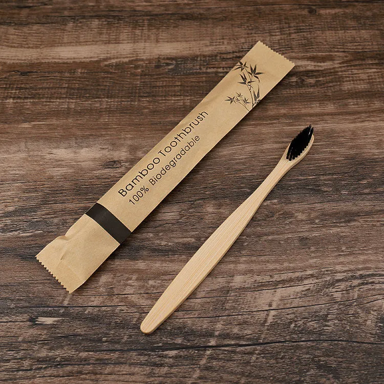 Set of 10 bamboo toothbrushes in multiple colours showing natural bamboo handles and soft bristles