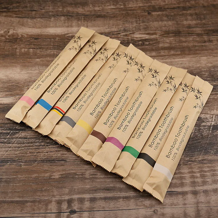 Set of 10 bamboo toothbrushes in multiple colours showing natural bamboo handles and soft bristles