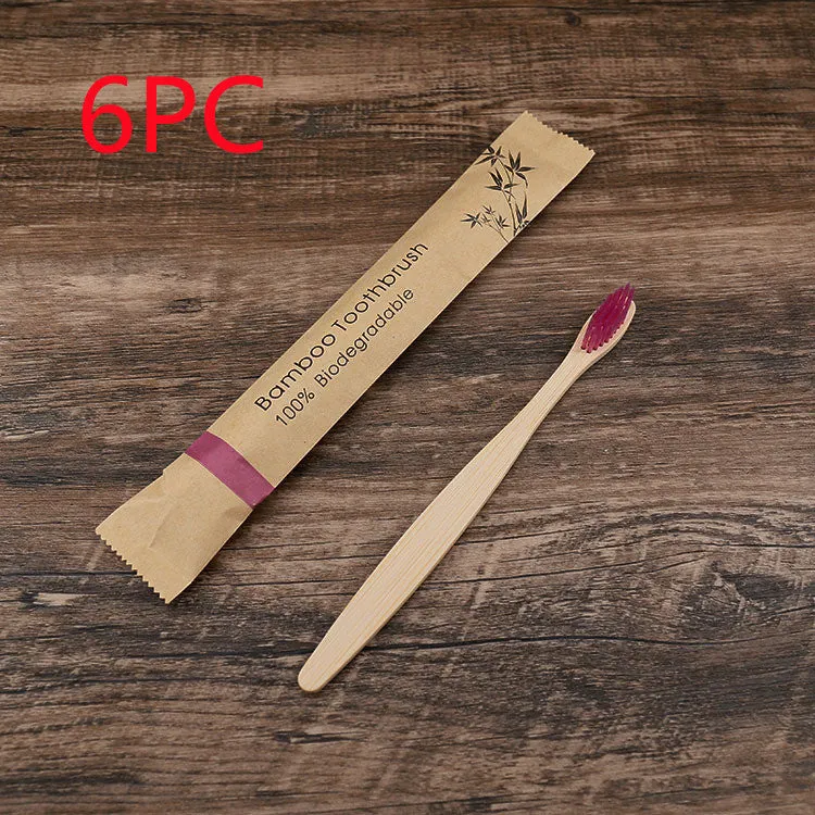 Set of 10 bamboo toothbrushes in multiple colours showing natural bamboo handles and soft bristles