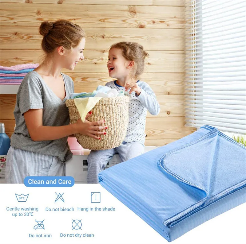 Blue and grey polyester cooling blanket with Japanese Q-Max fibres on a bed.