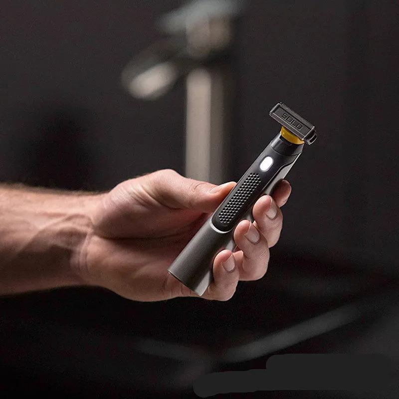 Black rechargeable men's precision shaver with LED light on and stainless steel blades.