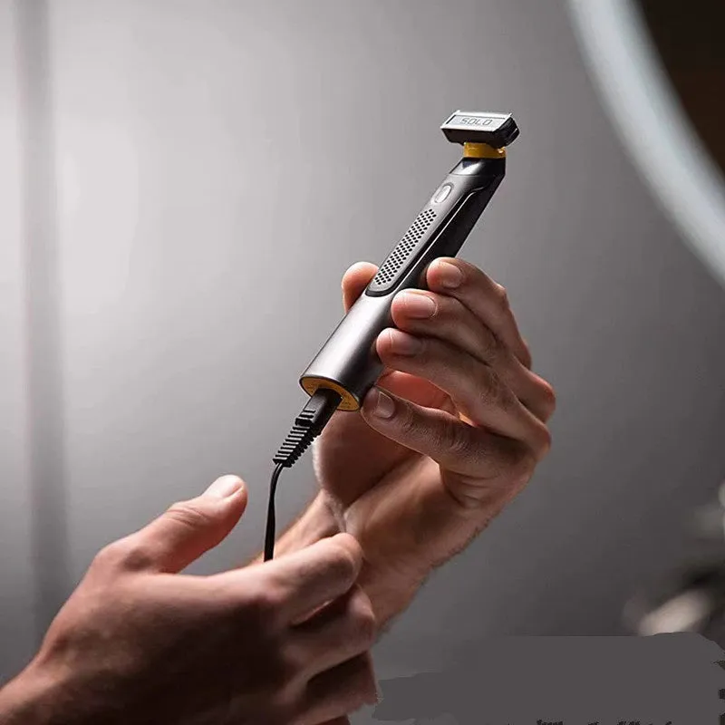 Black rechargeable men's precision shaver with LED light on and stainless steel blades.