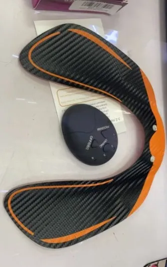Compact EMS hip muscle training stimulator device with adhesive gel pads for buttocks and abdomen.