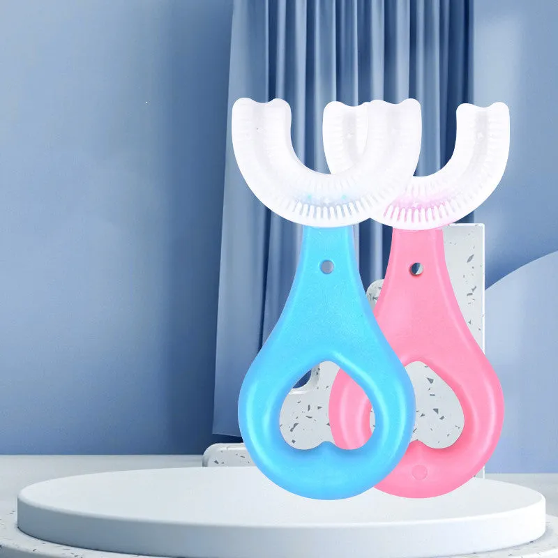 Children's U-shaped food grade soft rubber toothbrush in pink and blue for ages 2-12